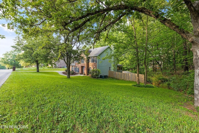view of yard with fence