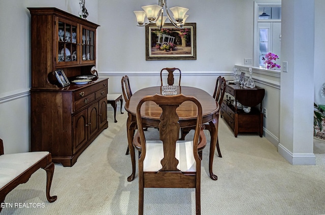 989 Rarity Bay Pkwy, Vonore, TN 37885 - dining room featuring a notable chandelier and light colored carpet