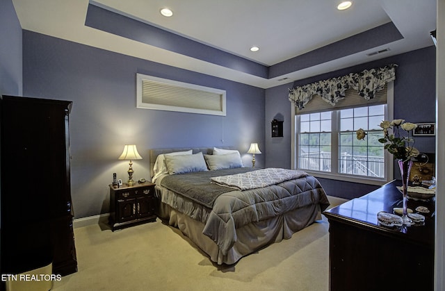 989 Rarity Bay Pkwy, Vonore, TN 37885 - carpeted bedroom with baseboards, visible vents, recessed lighting, and a tray ceiling