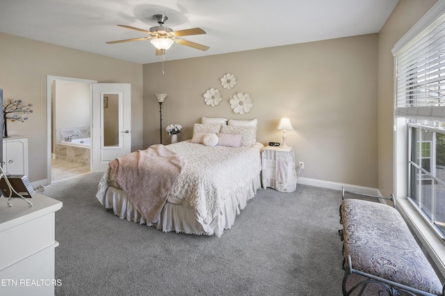 bedroom featuring ceiling fan, carpet flooring, baseboards, and ensuite bathroom