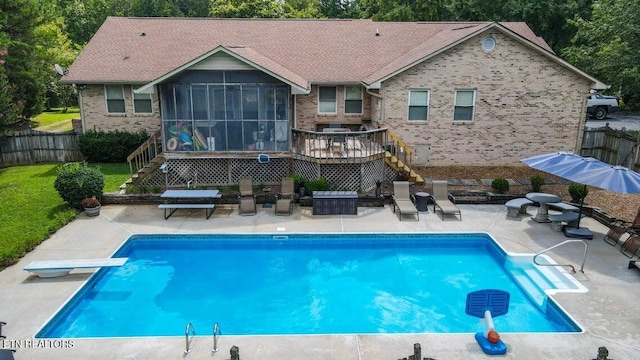 view of swimming pool with a sunroom, a fenced backyard, a patio area, stairs, and a fenced in pool