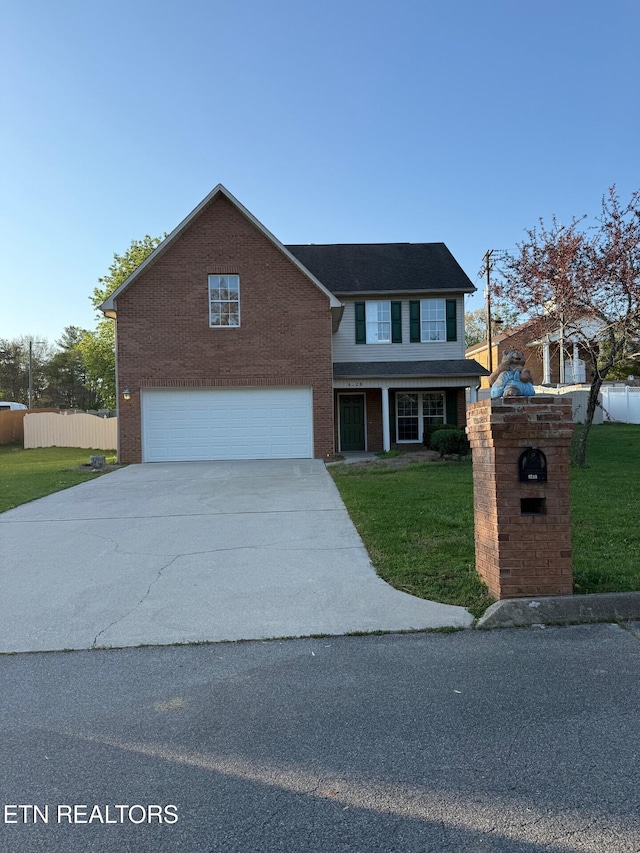 traditional-style home with a garage, fence, brick siding, a front lawn, and driveway
