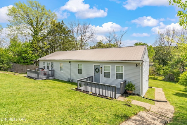 369 Robertsville Rd, Oak Ridge, TN 37830 - view of front of home featuring a wooden deck and metal roof