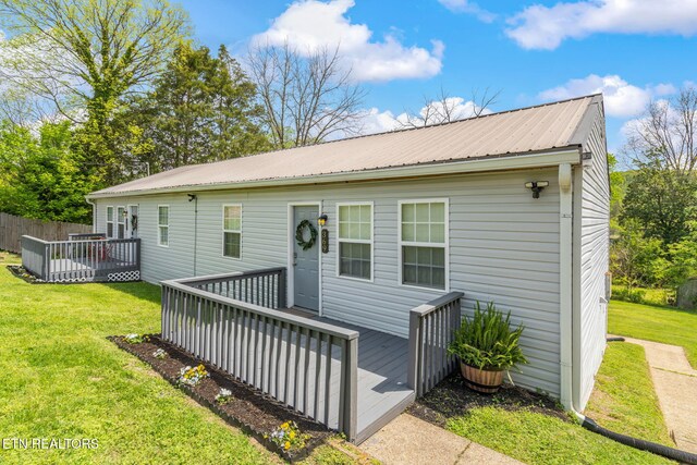 369 Robertsville Rd, Oak Ridge, TN 37830 - view of front of house featuring a wooden deck and metal roof