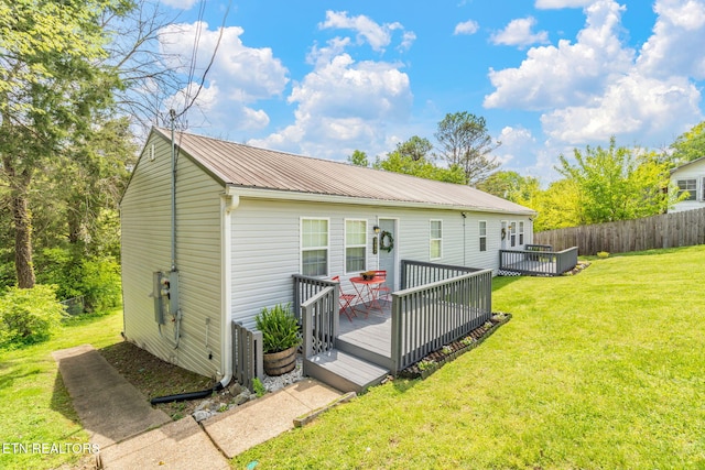 369 Robertsville Rd, Oak Ridge, TN 37830 - back of property with a deck and metal roof