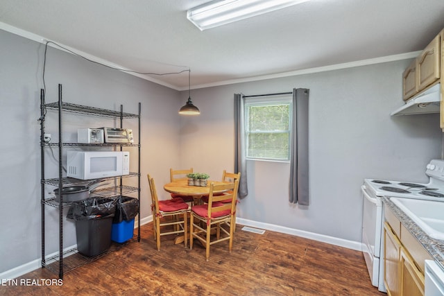 369 Robertsville Rd, Oak Ridge, TN 37830 - dining room with crown molding, dark wood finished floors, and baseboards