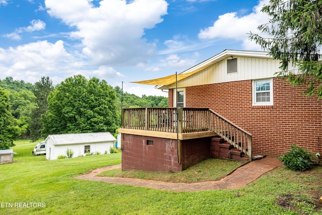 7324 Thorn Grove Pike, Knoxville, TN 37914 - view of side of home featuring a lawn, a wooden deck, and brick siding