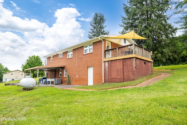 7324 Thorn Grove Pike, Knoxville, TN 37914 - rear view of house with central air condition unit, a lawn, a patio area, and brick siding