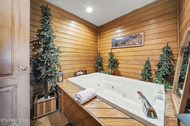 1348 N Baden Cir, Gatlinburg, TN 37738 - full bathroom with wooden walls and a jetted tub