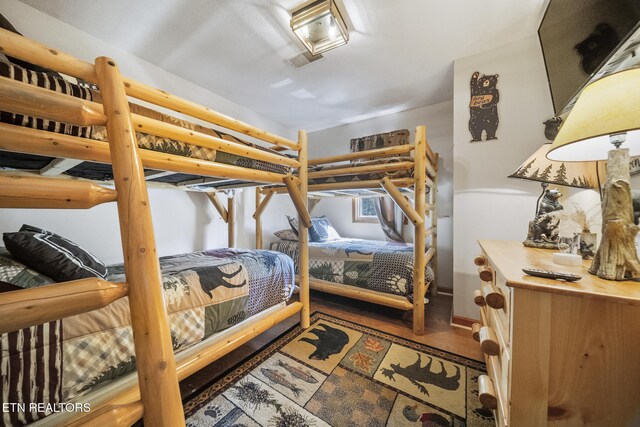 1348 N Baden Cir, Gatlinburg, TN 37738 - bedroom featuring wood finished floors