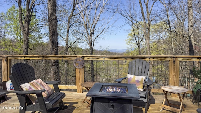 1348 N Baden Cir, Gatlinburg, TN 37738 - wooden deck with a fire pit and a mountain view