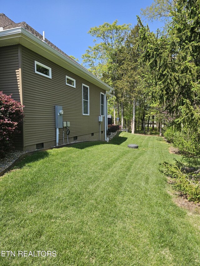 169 Dudi Trl, Vonore, TN 37885 - rear view of house featuring a yard