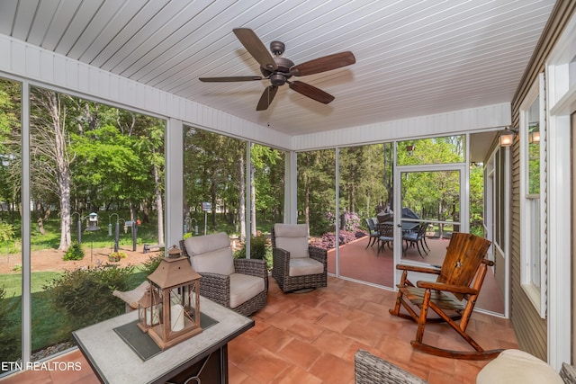 169 Dudi Trl, Vonore, TN 37885 - sunroom with a ceiling fan, outdoor dining area, and a healthy amount of sunlight