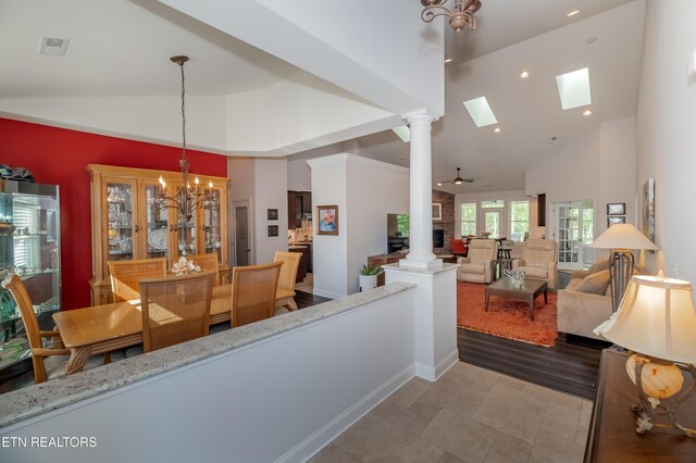 169 Dudi Trl, Vonore, TN 37885 - hallway featuring recessed lighting, a notable chandelier, ornate columns, a skylight, and high vaulted ceiling