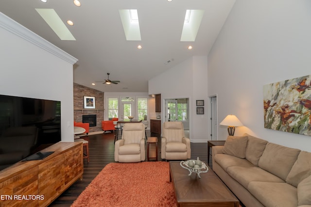 169 Dudi Trl, Vonore, TN 37885 - living room with high vaulted ceiling, a skylight, a fireplace, dark wood finished floors, and recessed lighting