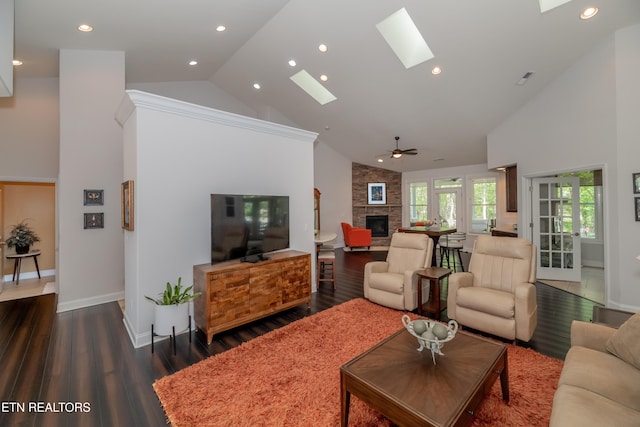169 Dudi Trl, Vonore, TN 37885 - living area with a fireplace, baseboards, high vaulted ceiling, and dark wood-style flooring