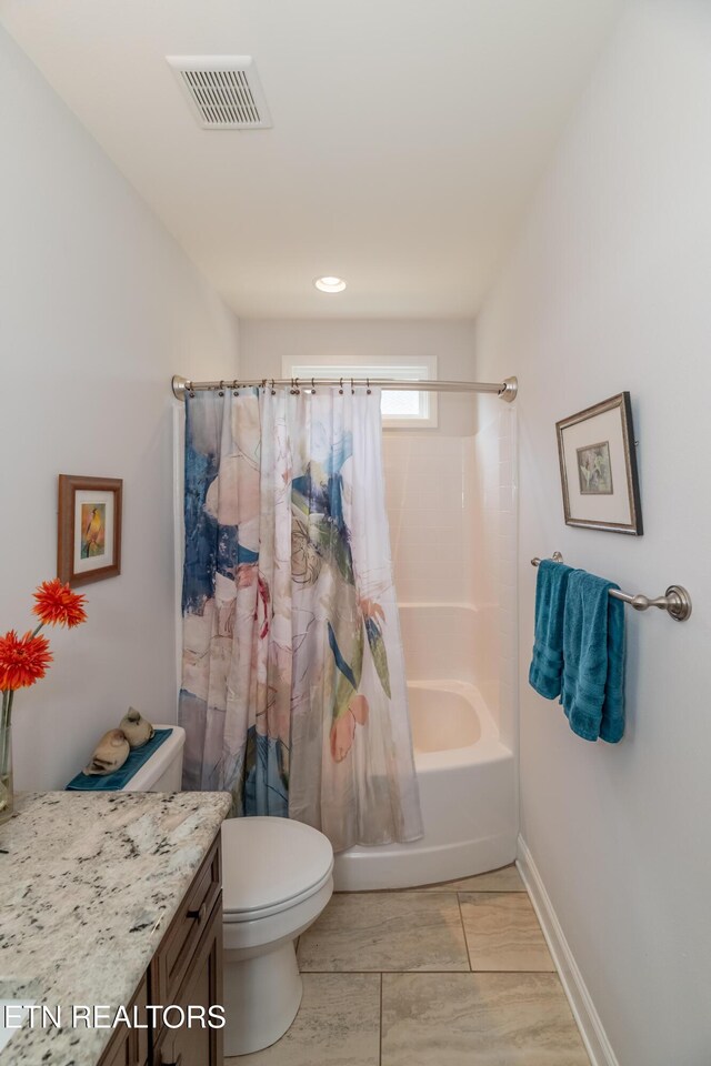 169 Dudi Trl, Vonore, TN 37885 - full bathroom with shower / bath combo, vanity, baseboards, toilet, and visible vents