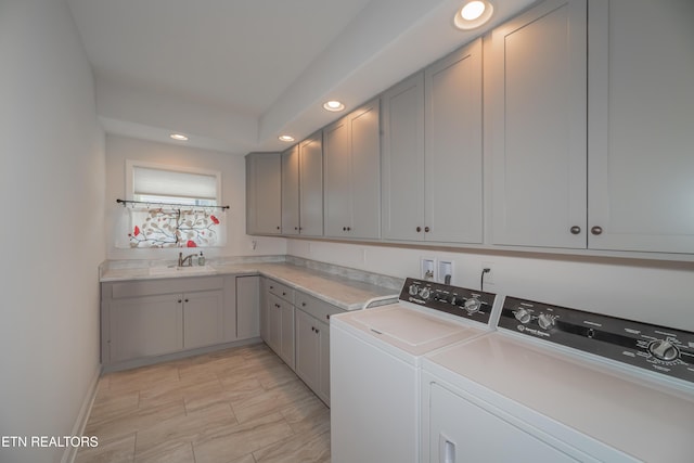 169 Dudi Trl, Vonore, TN 37885 - laundry area featuring recessed lighting, a sink, baseboards, washer and dryer, and cabinet space