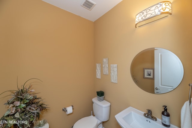 169 Dudi Trl, Vonore, TN 37885 - bathroom with visible vents, toilet, and a sink