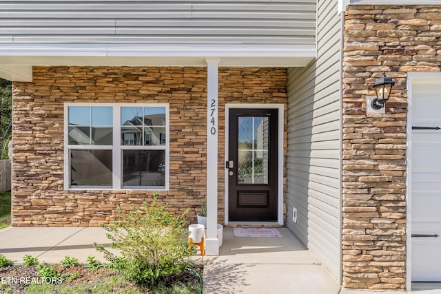 2740 Red Barn Rd, Knoxville, TN 37931 - property entrance featuring stone siding and covered porch