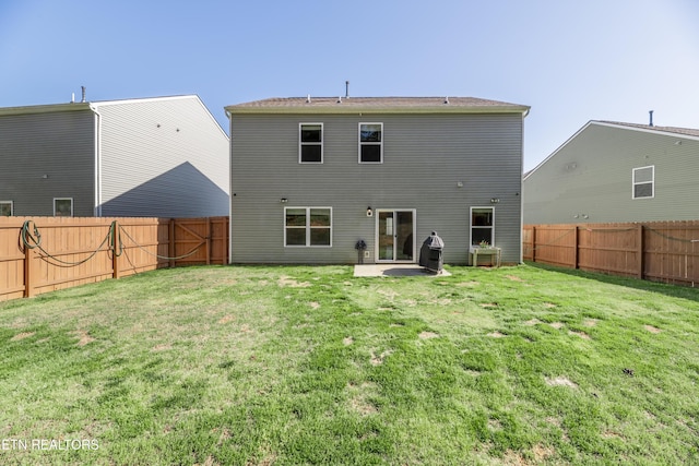 2740 Red Barn Rd, Knoxville, TN 37931 - rear view of house with a yard and a fenced backyard