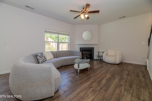 2740 Red Barn Rd, Knoxville, TN 37931 - living room with a ceiling fan, dark wood-style flooring, a glass covered fireplace, and visible vents