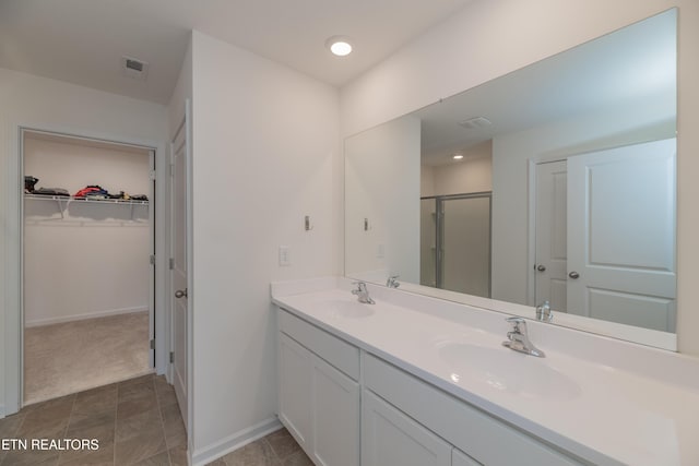 2740 Red Barn Rd, Knoxville, TN 37931 - full bath with double vanity, visible vents, a sink, and a stall shower