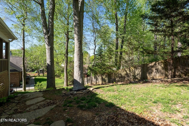 view of yard featuring fence