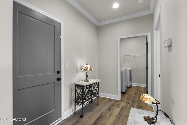 2718 Vista Meadows Ln, Sevierville, TN 37876 - entrance foyer featuring crown molding, baseboards, washing machine and dryer, and wood finished floors
