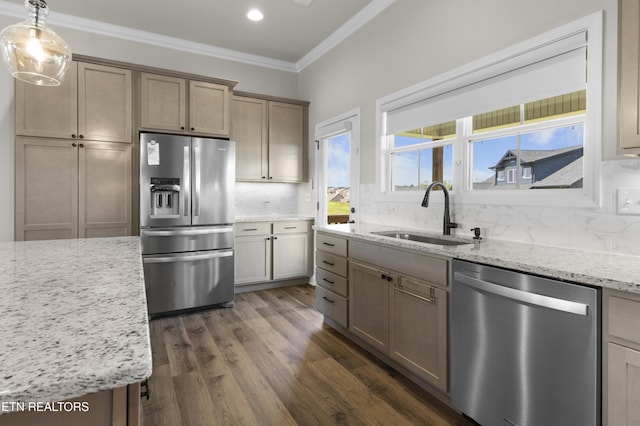 2718 Vista Meadows Ln, Sevierville, TN 37876 - kitchen with backsplash, appliances with stainless steel finishes, a sink, dark wood-style floors, and ornamental molding