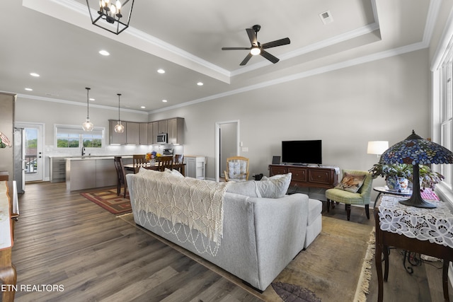 2718 Vista Meadows Ln, Sevierville, TN 37876 - living area with a ceiling fan, dark wood-style flooring, visible vents, ornamental molding, and recessed lighting