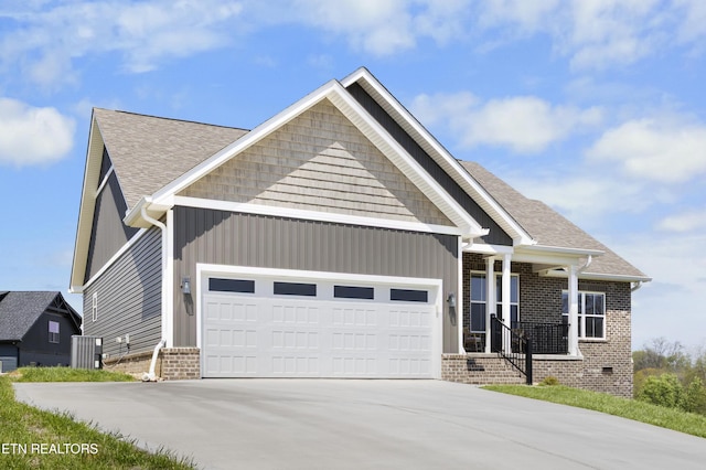 2718 Vista Meadows Ln, Sevierville, TN 37876 - craftsman inspired home with central AC, covered porch, brick siding, concrete driveway, and an attached garage