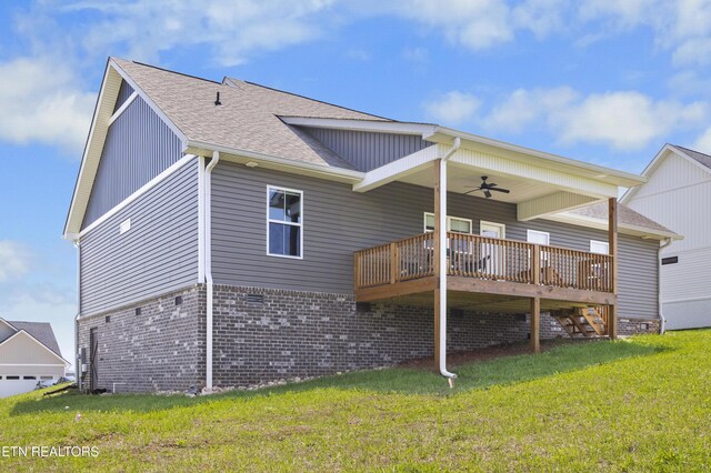 2718 Vista Meadows Ln, Sevierville, TN 37876 - back of house with a wooden deck, roof with shingles, a ceiling fan, board and batten siding, and a lawn