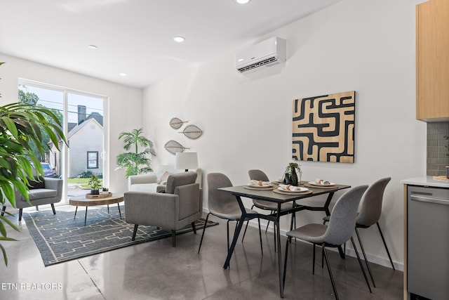 105 E Oldham Ave Unit 103, Knoxville, TN 37917 - dining room featuring a wall mounted AC, finished concrete flooring, recessed lighting, and baseboards