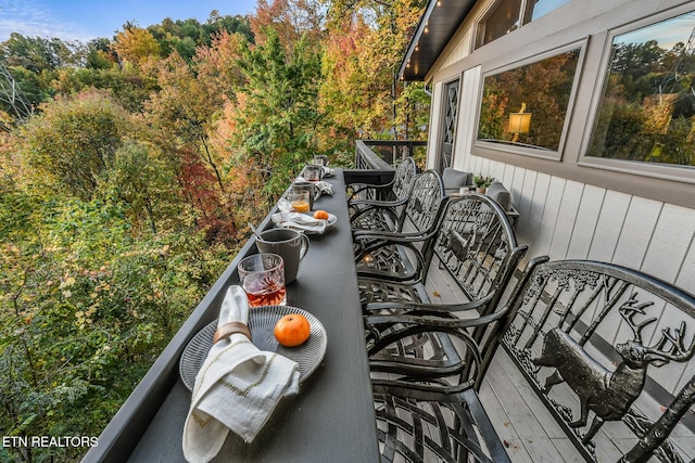 balcony featuring outdoor dining area