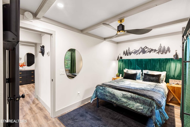 bedroom with baseboards, a ceiling fan, wood finished floors, and beam ceiling