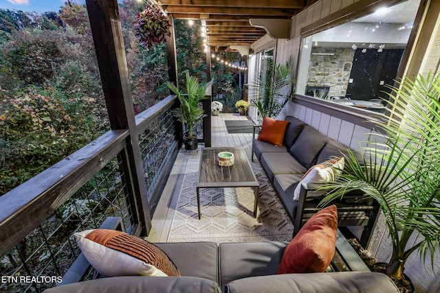 balcony with an outdoor hangout area