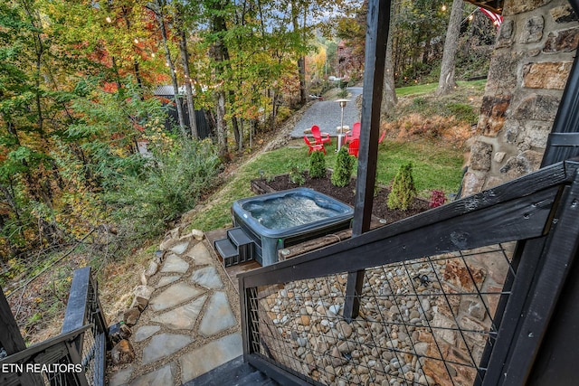 exterior details featuring a jacuzzi