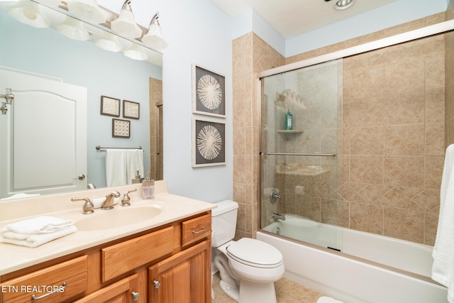 222 Pinnacle Pt, Andersonville, TN 37705 - bathroom featuring tile patterned floors, vanity, toilet, and bath / shower combo with glass door