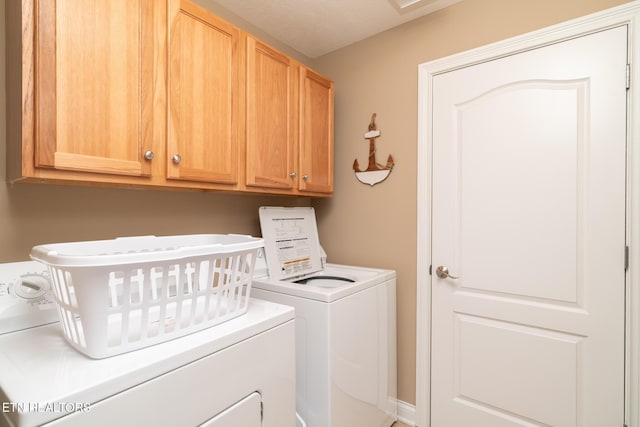 222 Pinnacle Pt, Andersonville, TN 37705 - washroom with cabinet space and independent washer and dryer