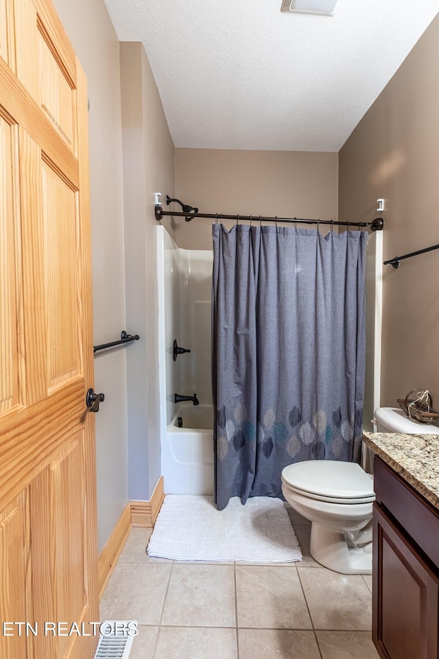 bathroom featuring tile patterned floors, vanity, toilet, and shower / tub combo with curtain