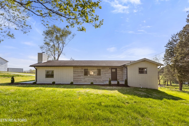 5911 Roberts Rd, Corryton, TN 37721 - rear view of house featuring brick siding, a lawn, a shingled roof, and a chimney
