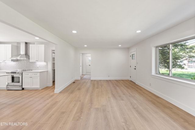5911 Roberts Rd, Corryton, TN 37721 - unfurnished living room with recessed lighting, a healthy amount of sunlight, and baseboards
