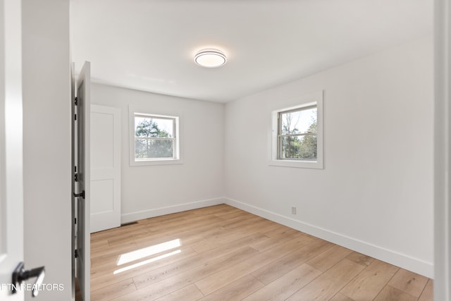 5911 Roberts Rd, Corryton, TN 37721 - unfurnished room with baseboards and light wood-style flooring