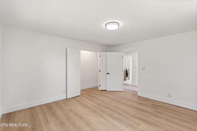 5911 Roberts Rd, Corryton, TN 37721 - unfurnished bedroom with light wood-style flooring and baseboards