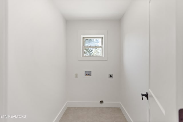 5911 Roberts Rd, Corryton, TN 37721 - laundry area with laundry area, light tile patterned floors, hookup for an electric dryer, hookup for a washing machine, and baseboards