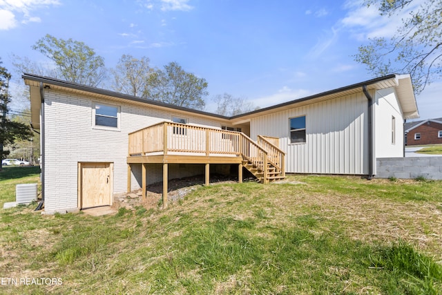 5911 Roberts Rd, Corryton, TN 37721 - back of property with a wooden deck, stairs, and a yard