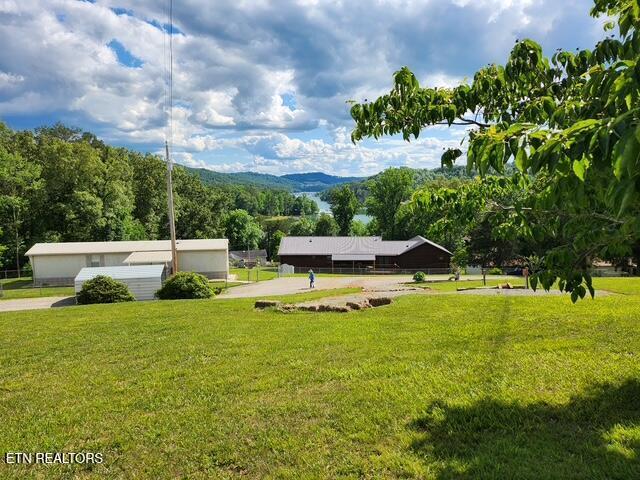 view of community with a lawn