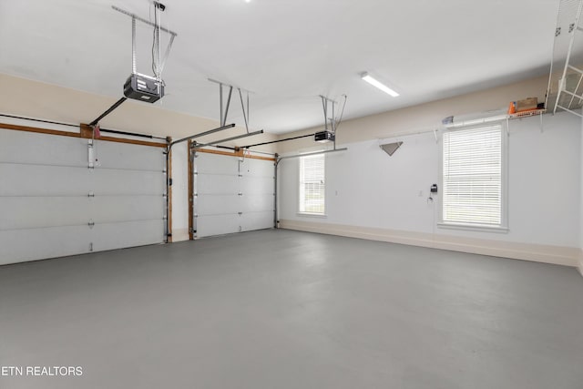 garage featuring a garage door opener
