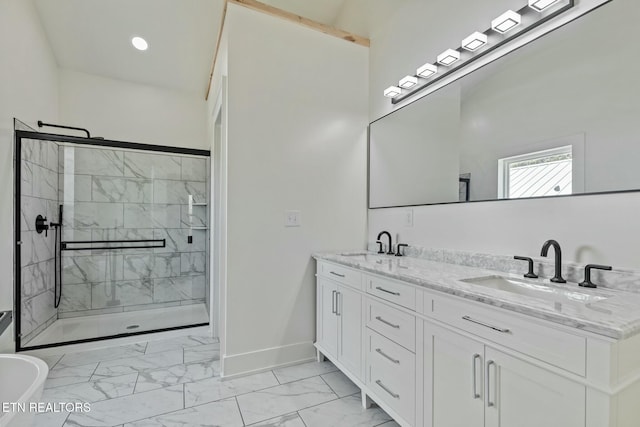 bathroom with baseboards, a shower stall, a sink, and marble finish floor